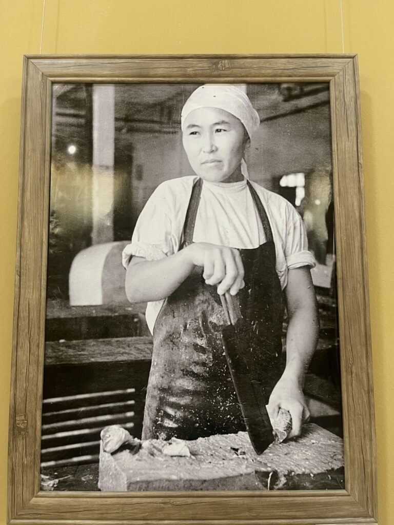 Worker at the fish canning factory